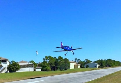 Plane landing at Tailwinds air strip